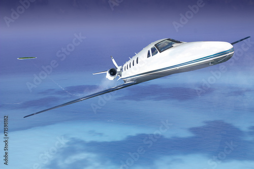 Private jet plane in the blue sky with sea and island
