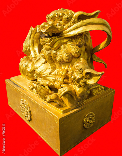 Gold chinese lion  on red background.