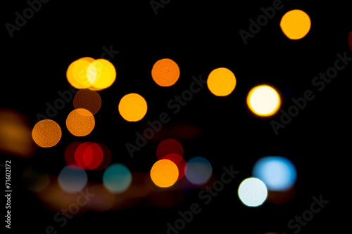 Multicolored defocused bokeh lights at Night for background or