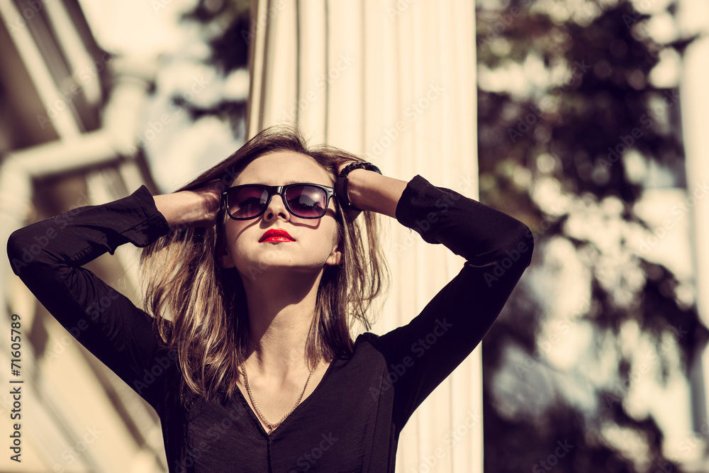 Fototapeta premium Young fashion pretty woman outdoor autumn sunny portrait.