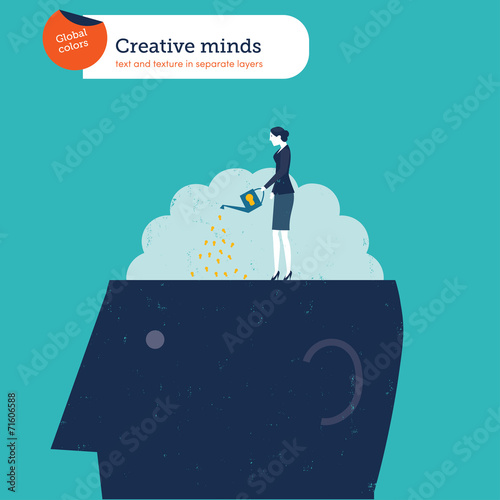 Businesswoman watering a brain