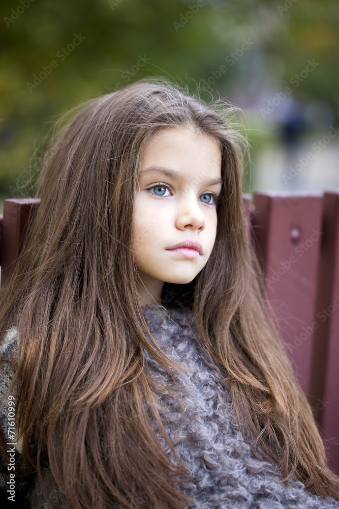 Beautifal little girl in the autumn park Beautifal little girl in the autumn park