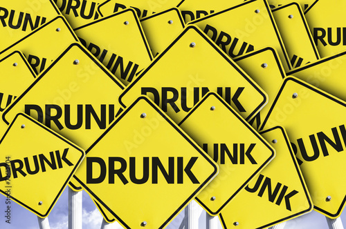 Drunk written on multiple road sign