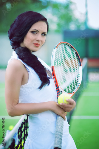Beautiful woman playing tennis © Forewer