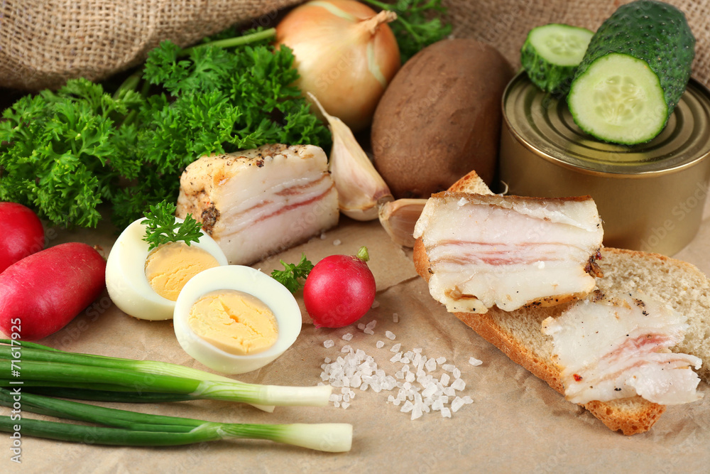 Bacon, fresh vegetables, boiled egg and bread