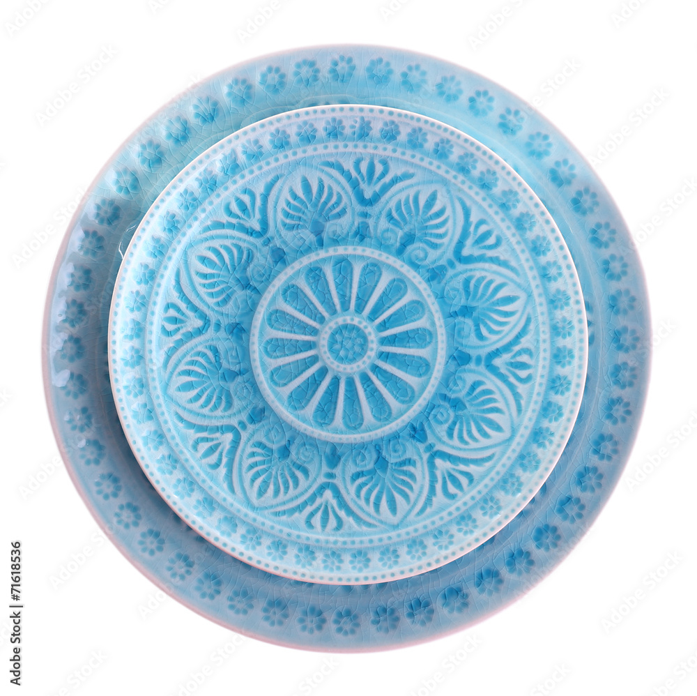 Fototapeta premium Blue plate isolated on white