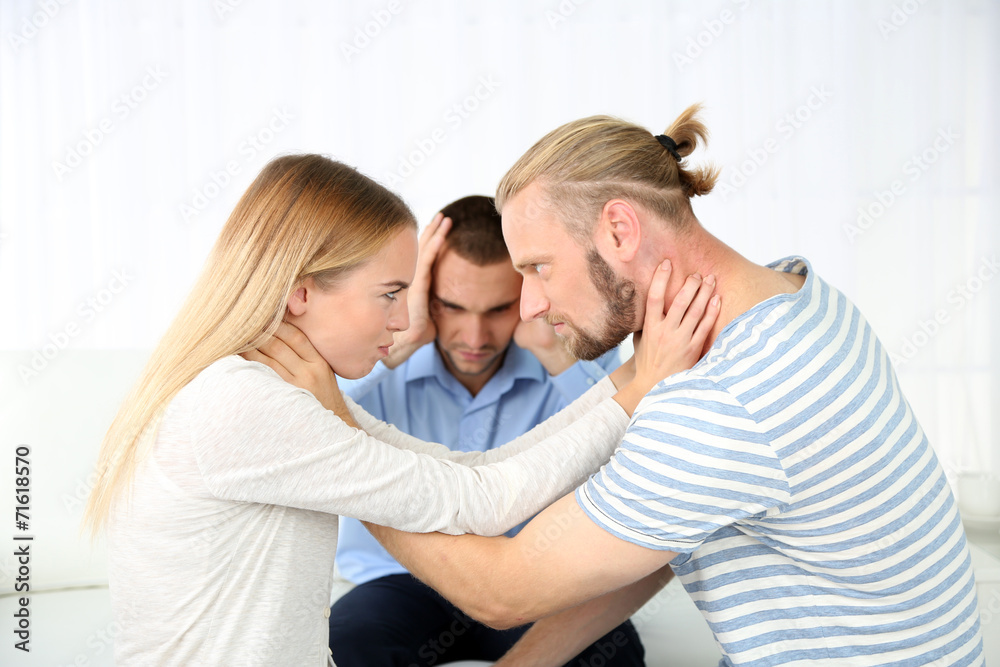 Young couple with problem on reception for family psychologist Young couple with problem on reception for family psychologist