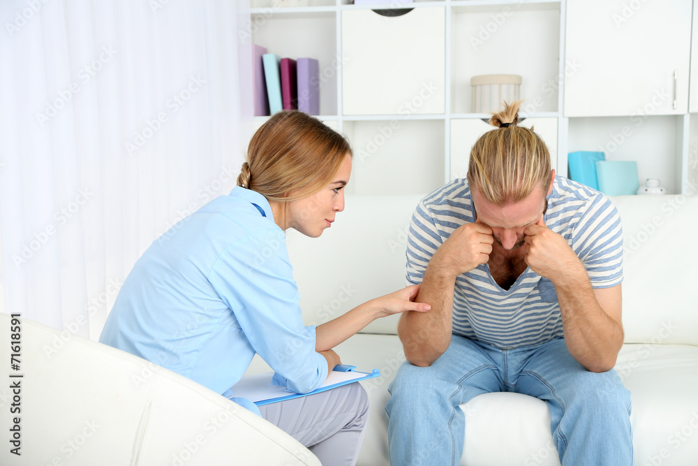 Young man on reception at psychologist