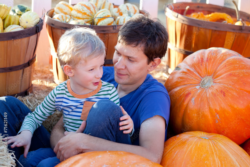 Fototapeta premium family at pumpkin patch