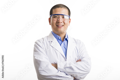 Young doctor standing isolated on white