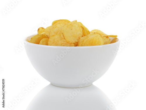 heap of potato chips with paprika