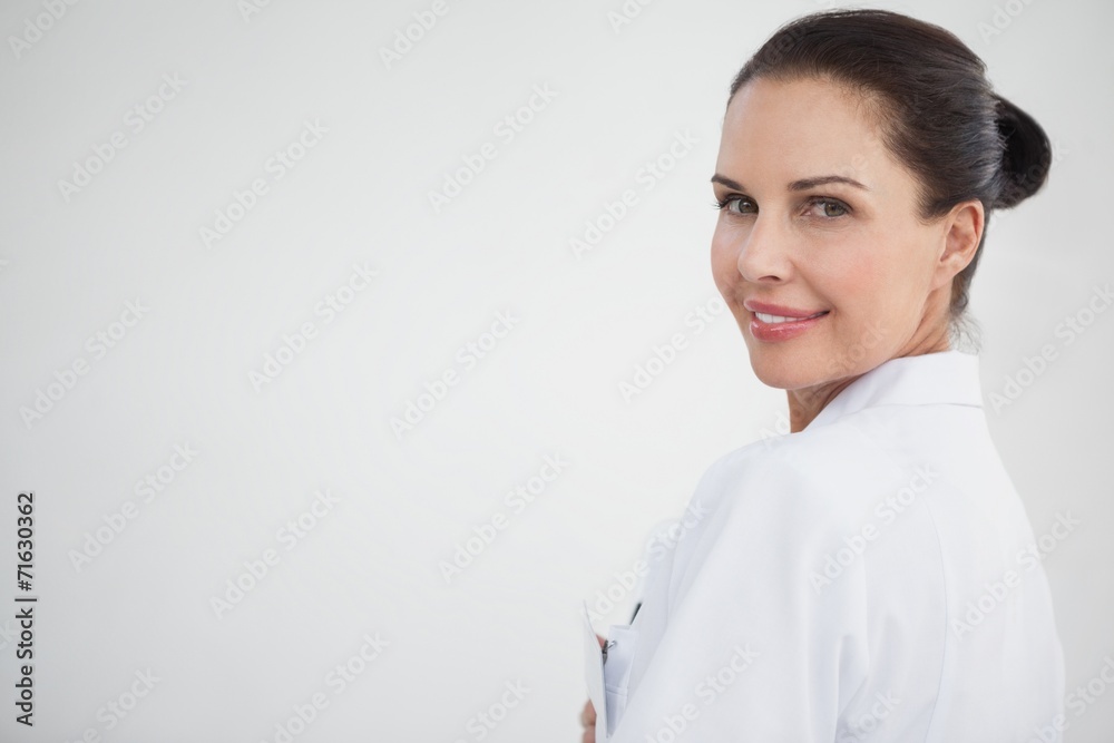 Smiling doctor looking at camera Smiling doctor looking at camera