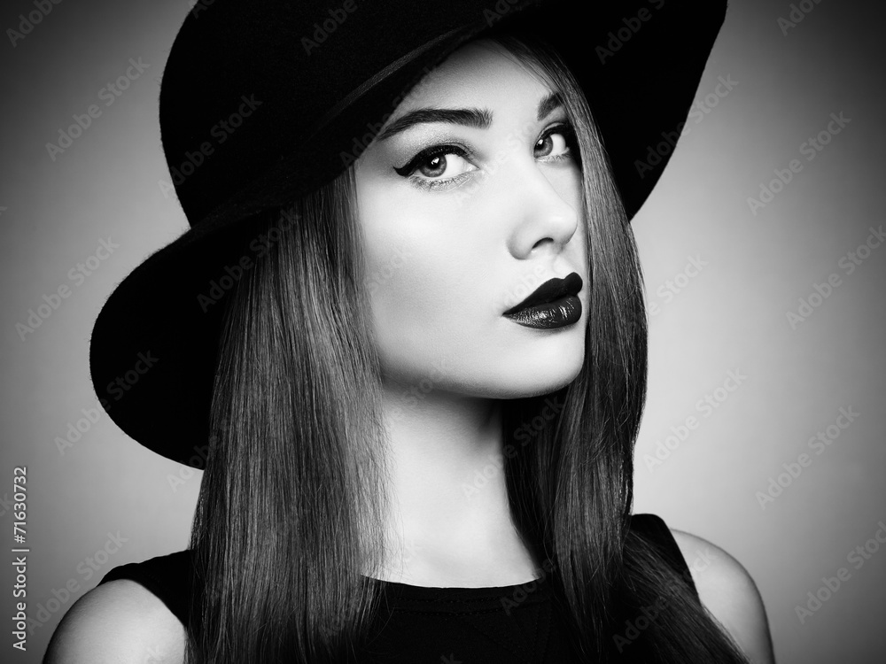 Fashion photo of young magnificent woman in hat. Girl posing Fashion photo of young magnificent woman in hat. Girl posing