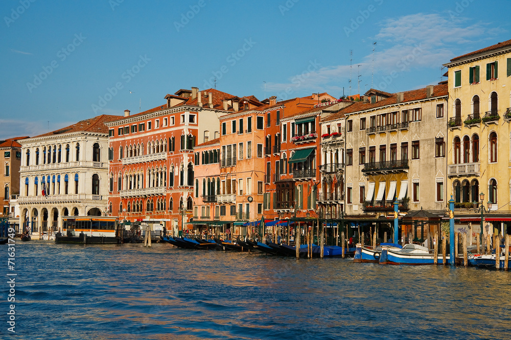 Boats and gondolas in Grand canal in Venice, Italy.