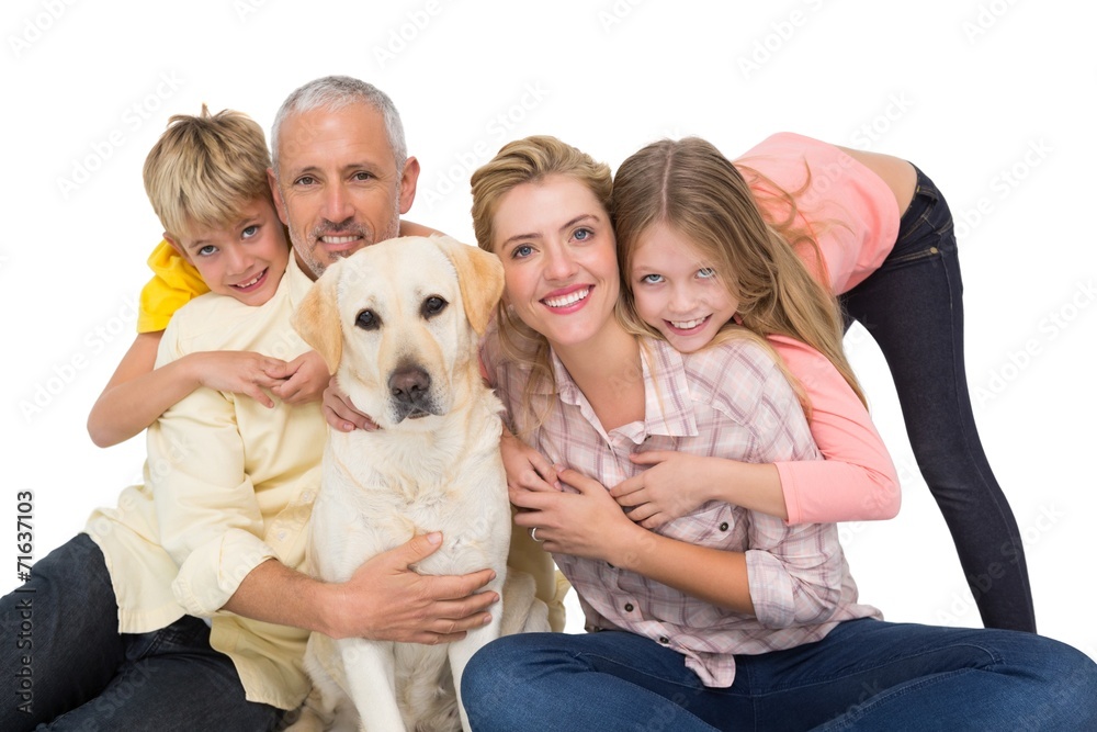 Happy family with their pet dog