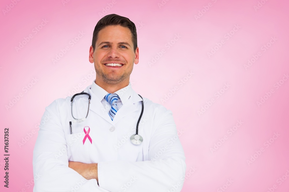 Composite image of handsome doctor with arms crossed Composite image of handsome doctor with arms crossed