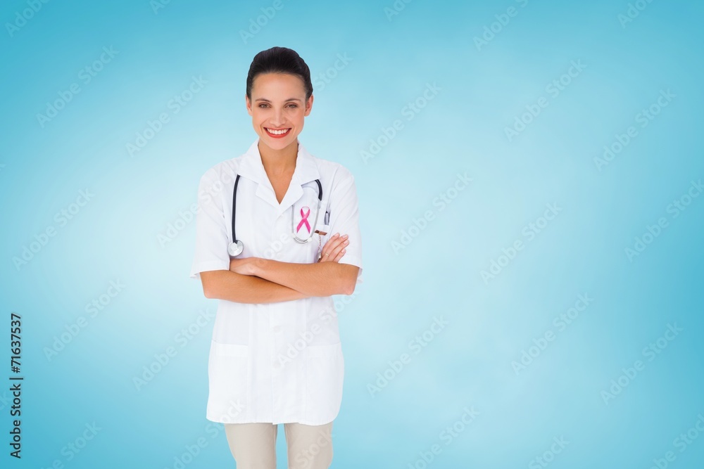 Composite image of pretty nurse with arms crossed Composite image of pretty nurse with arms crossed