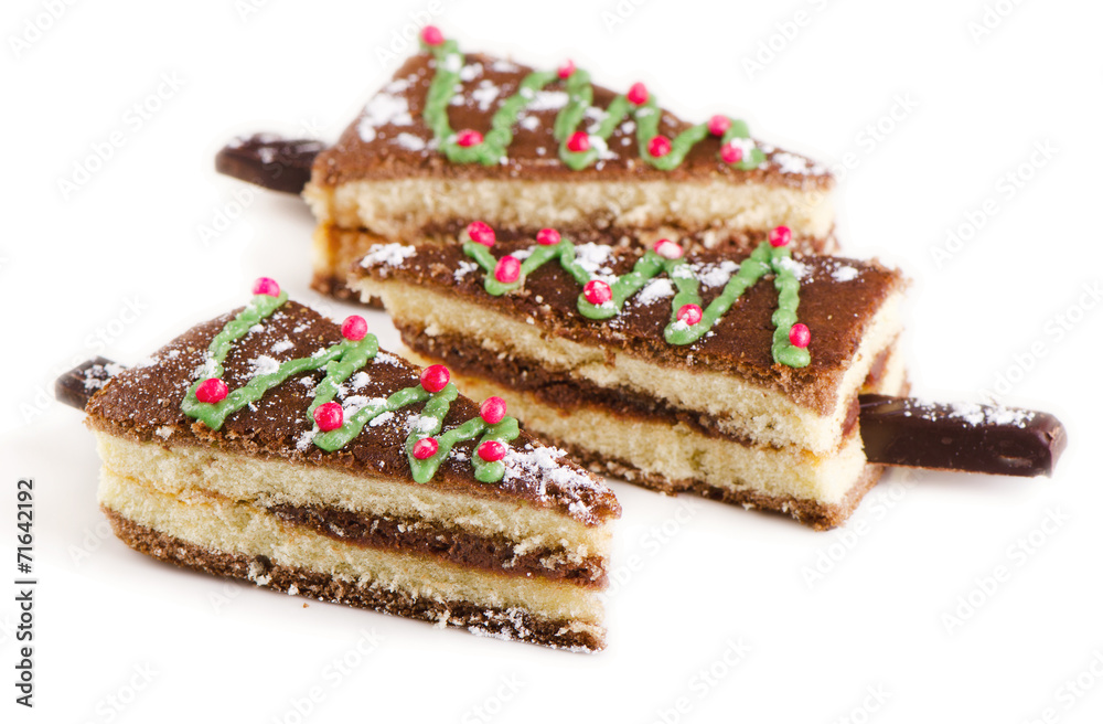 Christmas tree made of sweet cake isolated on a white Christmas tree made of sweet cake isolated on a white
