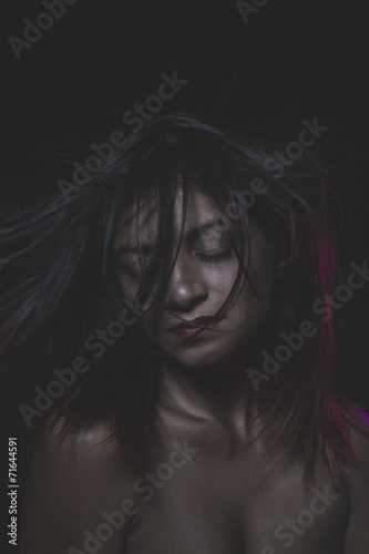Tribal, Beautiful latina woman with hair flying © Fernando Cortés