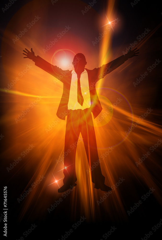 A businessman with open arms against abstract energy background