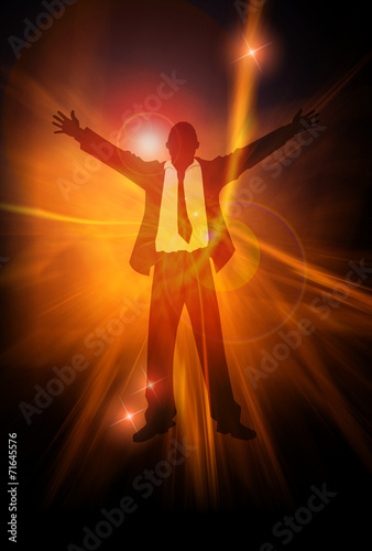 A businessman with open arms against abstract energy background