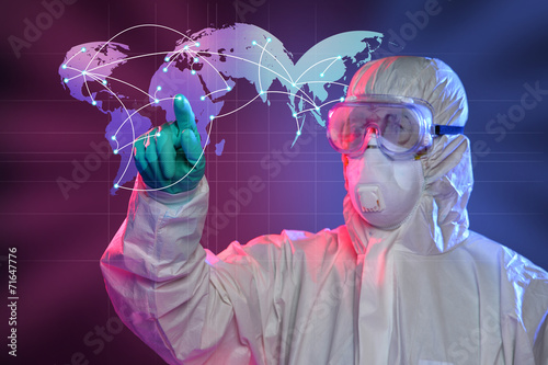 Scientist Touching Screen Where Ebola Virus Started photo