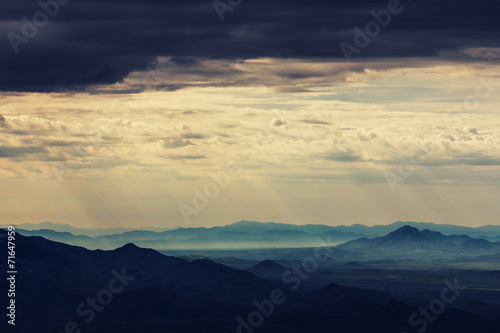 Sunbeams over mountains © ShutterDivision