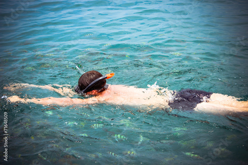 top view of a Man snorkeling in the sea