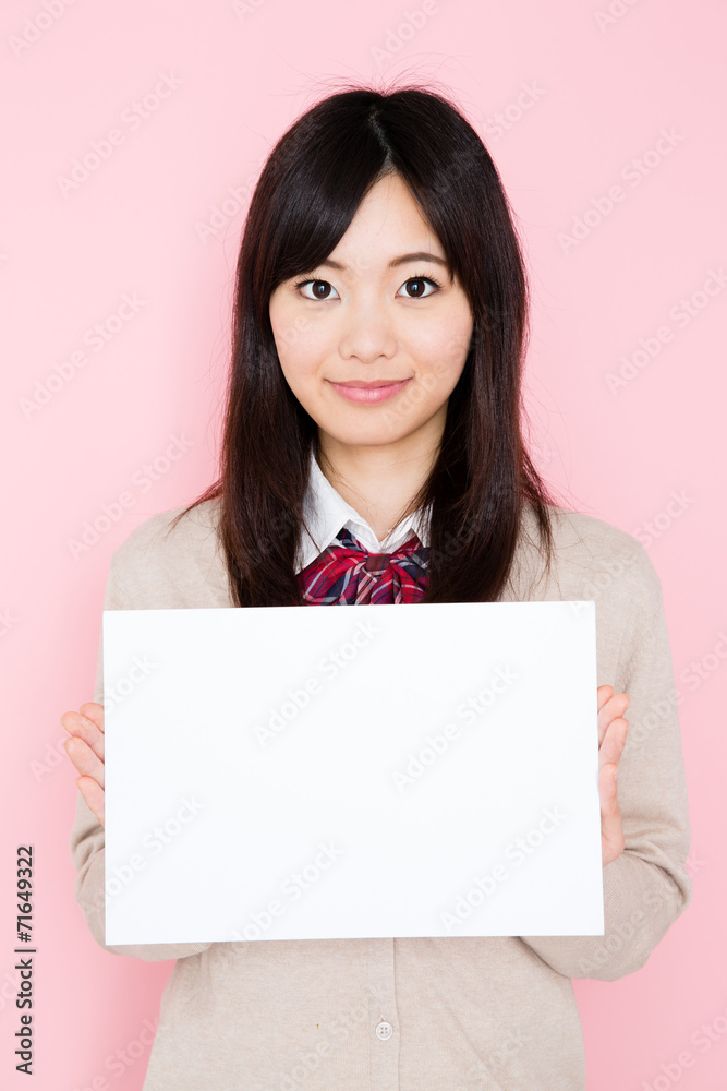 young asian woman on pink background young asian woman on pink background