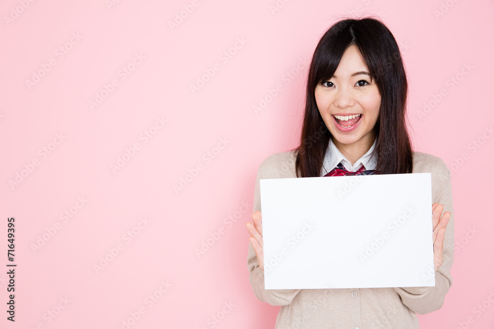 young asian woman on pink background young asian woman on pink background