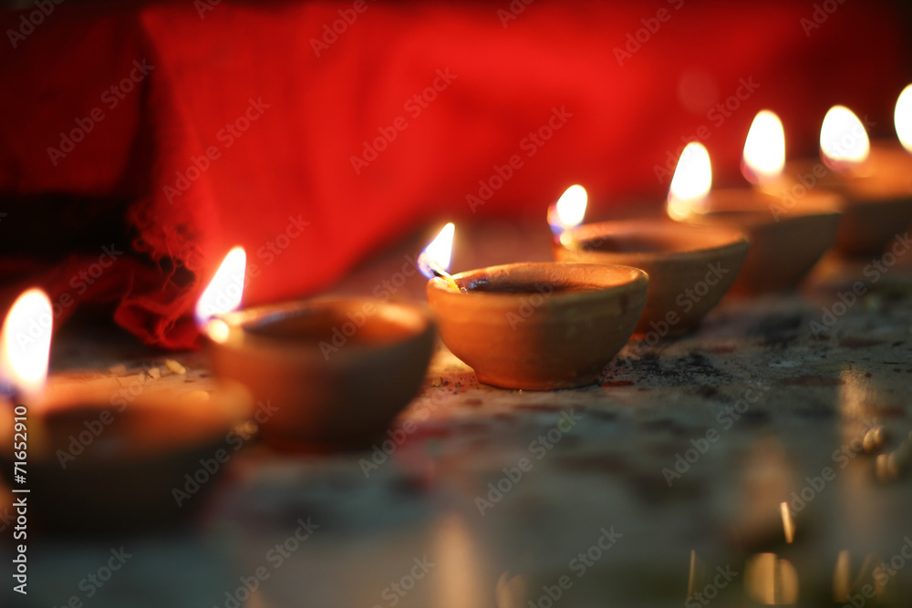 traditional oil lamps on diwali - obrazy, fototapety, plakaty 