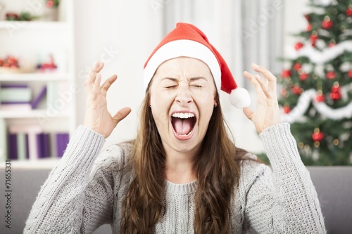 young girl shout because of christmas stress