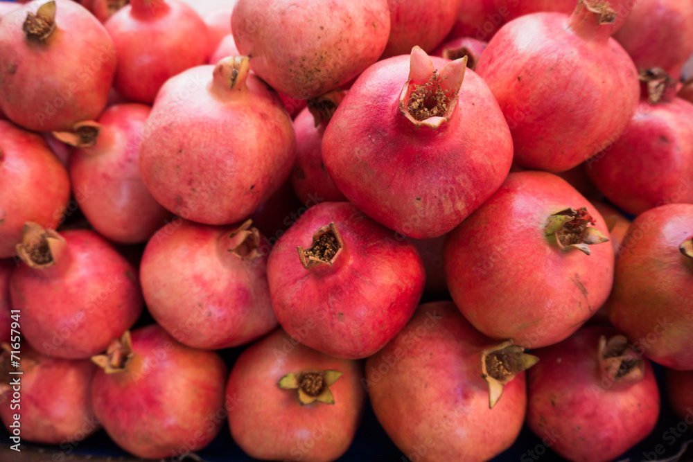 Pomegranates at the Market. Fresh farmer's market pomegranates. Pomegranates at the Market. Fresh farmer's market pomegranates.
