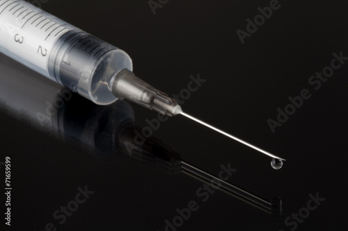 Syringe with needle and medication