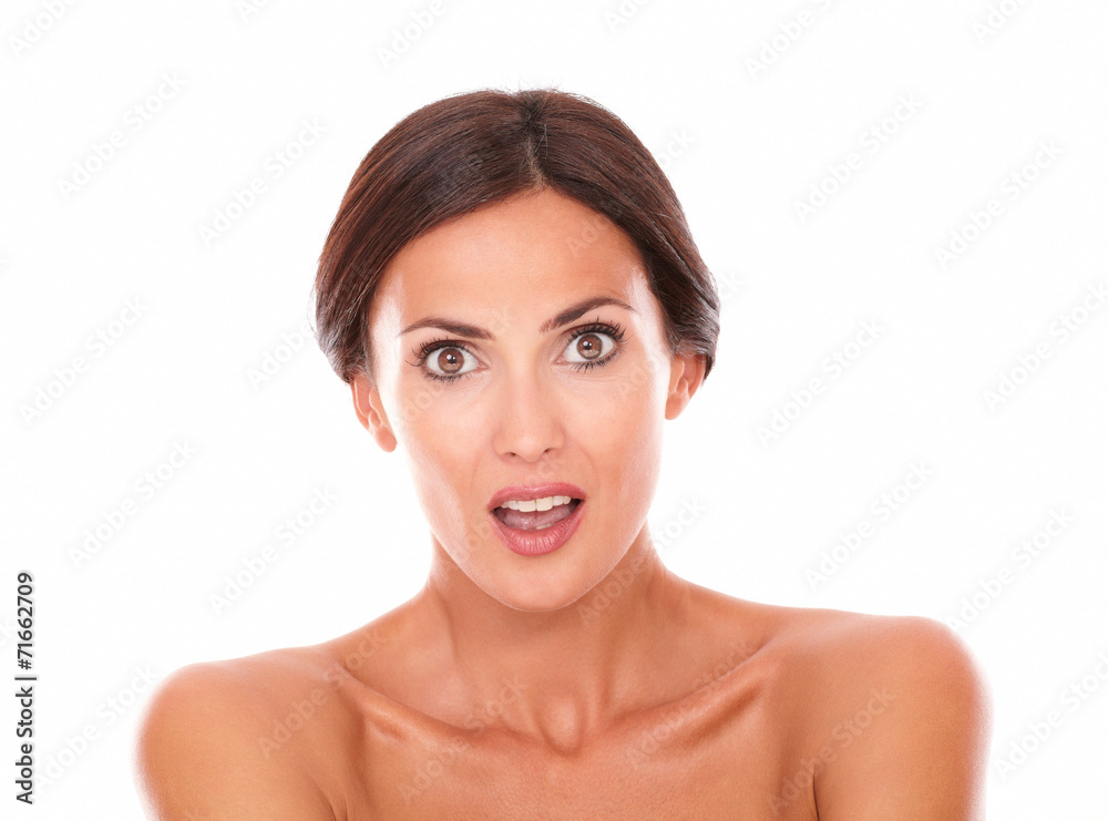 Surprised charming woman looking at camera Surprised charming woman looking at camera