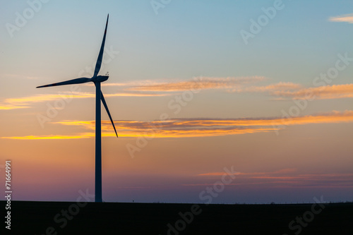 wind turbine at sunset background