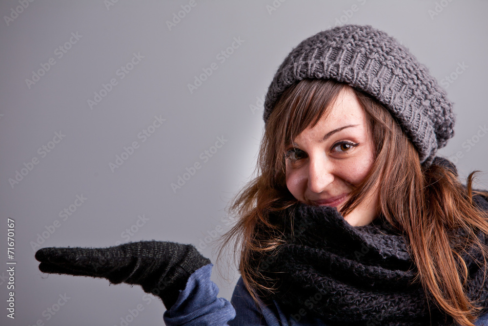 girl in winter clothes showing off COPY SPACE girl in winter clothes showing off COPY SPACE