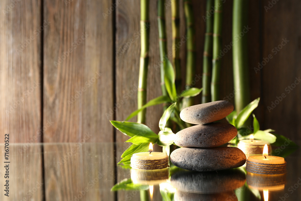 Obraz premium Spa stones, candles and bamboo branches