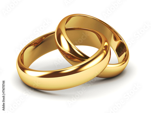 A pair of gold wedding rings photo