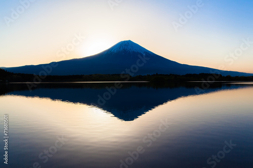 Silhouette of Mount Fuji reflected in Lake Tanukiko