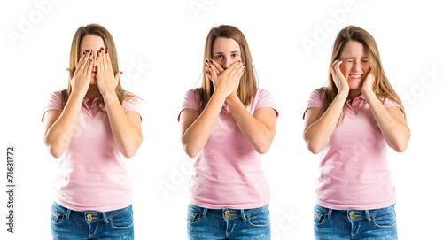 Young girl doing surprise gesture over white background