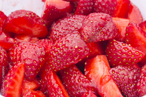 Closeup of many fresh chopped strawberries