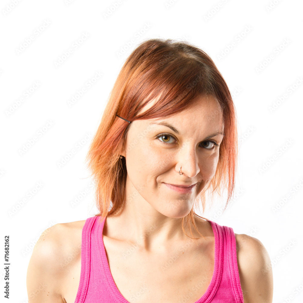 Redhead girl over isolated white background Redhead girl over isolated white background