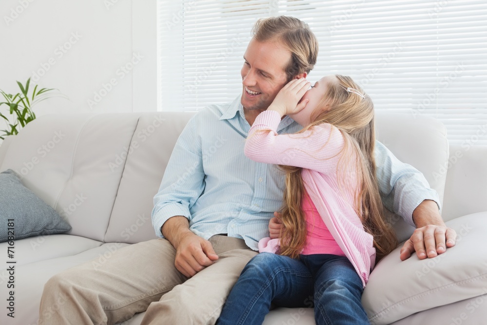 Casual father and daughter on the couch Casual father and daughter on the couch