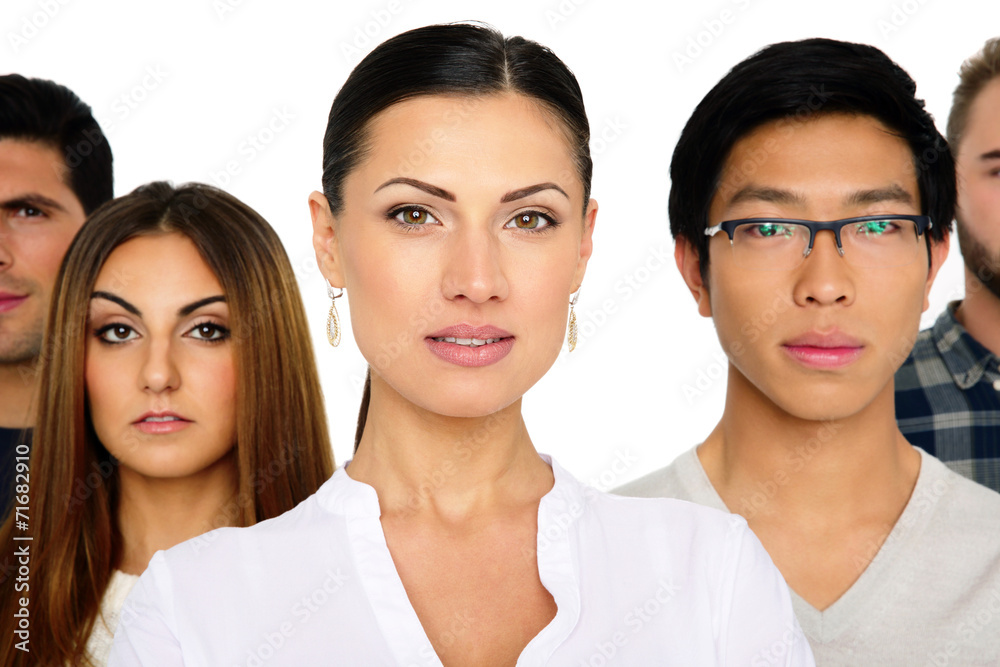 Group of a young people standing over white background Group of a young people standing over white background