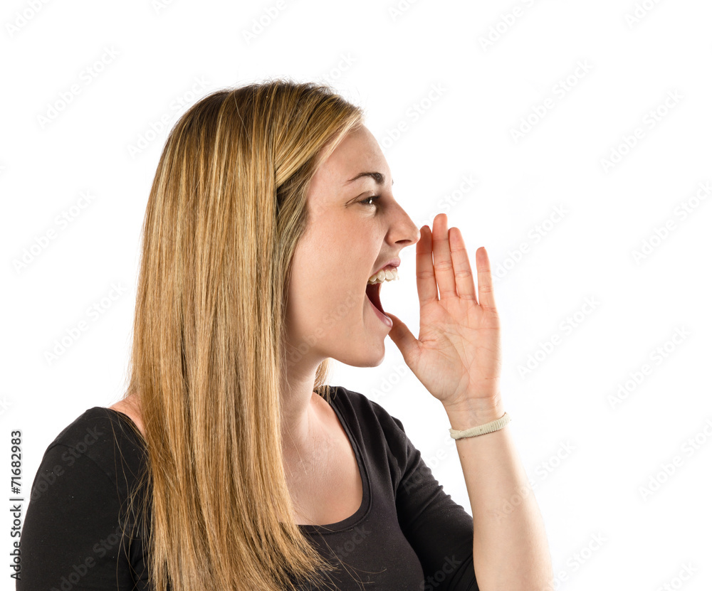 Girl shouting over isolated white background Girl shouting over isolated white background