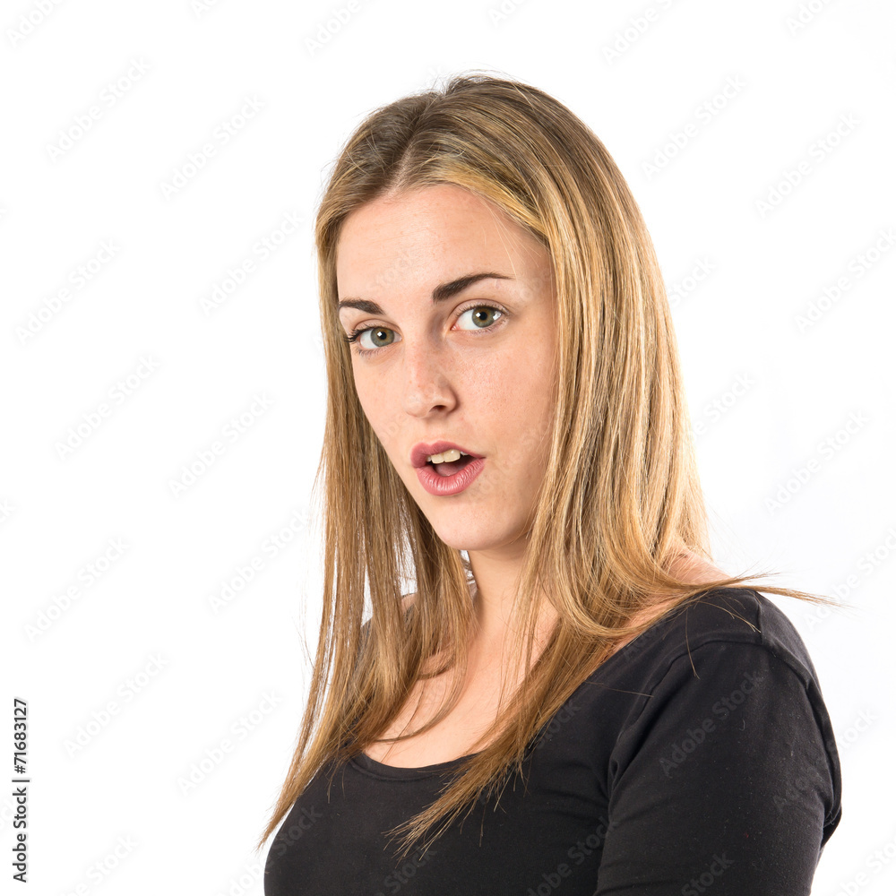 Girl doing surprise gesture over white background Girl doing surprise gesture over white background