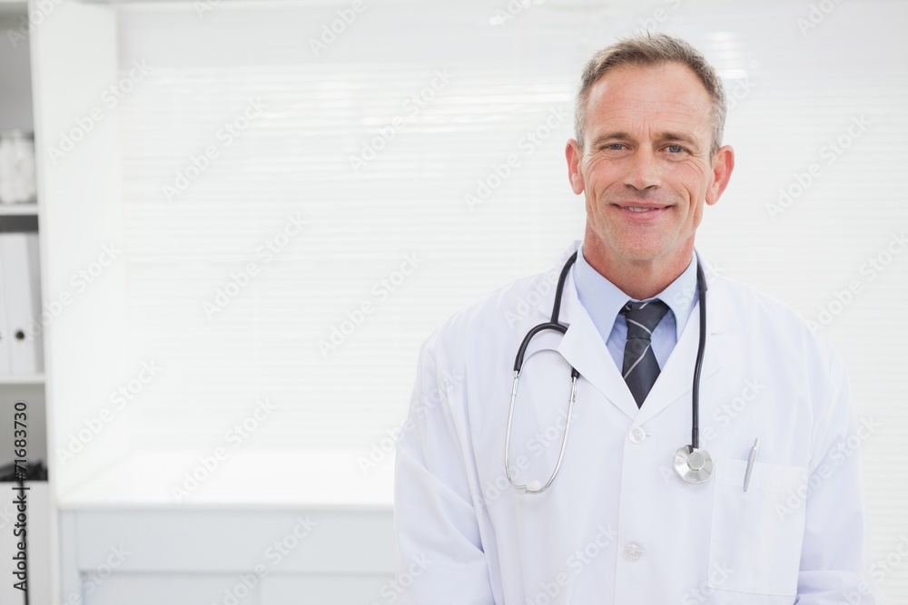 Smiling doctor looking at camera Smiling doctor looking at camera