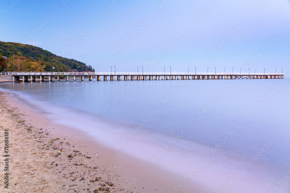 Fototapeta premium Baltic pier in Gdynia Orlowo at dusk, Poland