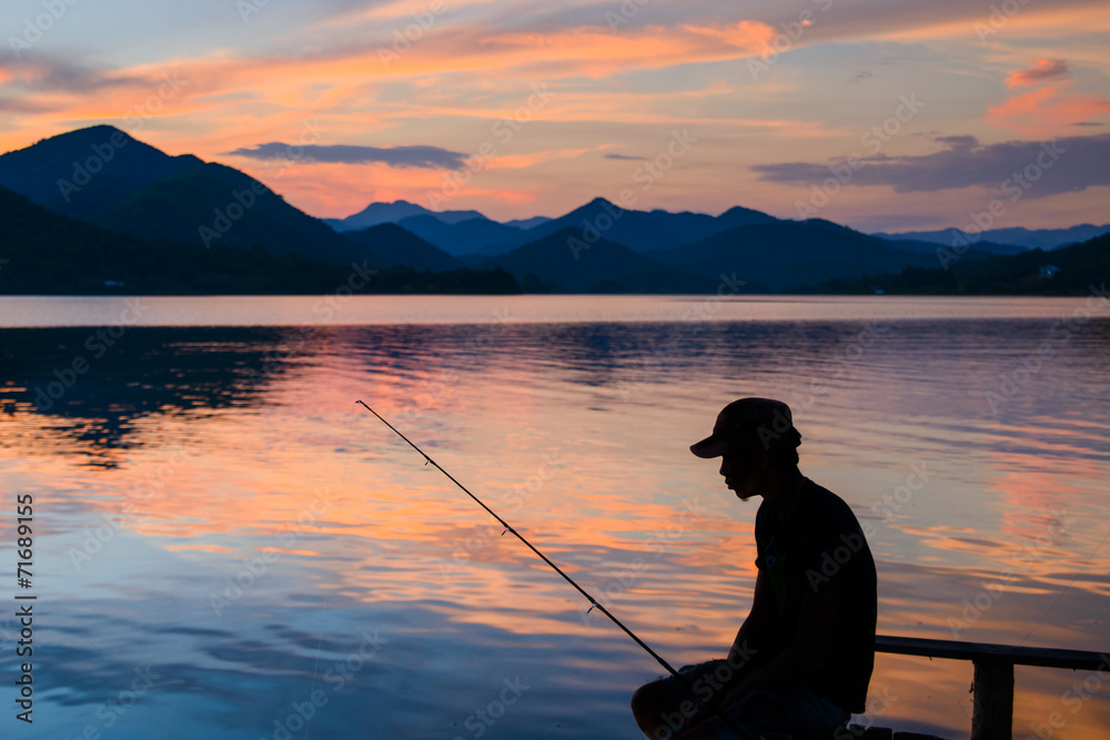 Silhouette of a fisherman